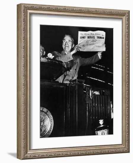 Victorious President Harry Truman Displaying Chicago Daily Tribune Headline, Dewey Defeats Truman-W^ Eugene Smith-Framed Photographic Print