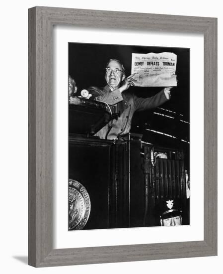 Victorious President Harry Truman Displaying Chicago Daily Tribune Headline, Dewey Defeats Truman-W^ Eugene Smith-Framed Photographic Print