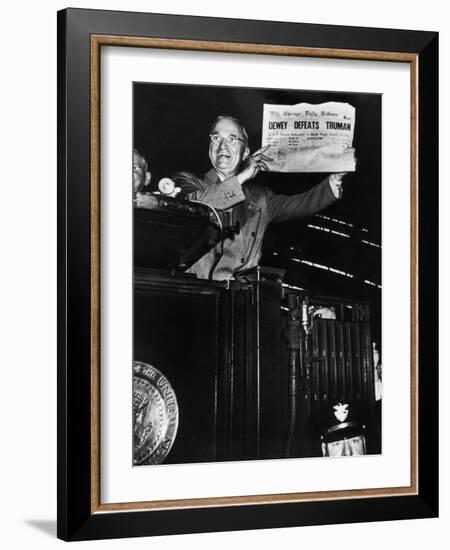 Victorious President Harry Truman Displaying Chicago Daily Tribune Headline, Dewey Defeats Truman-W^ Eugene Smith-Framed Photographic Print