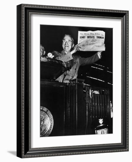 Victorious President Harry Truman Displaying Chicago Daily Tribune Headline, Dewey Defeats Truman-W^ Eugene Smith-Framed Photographic Print