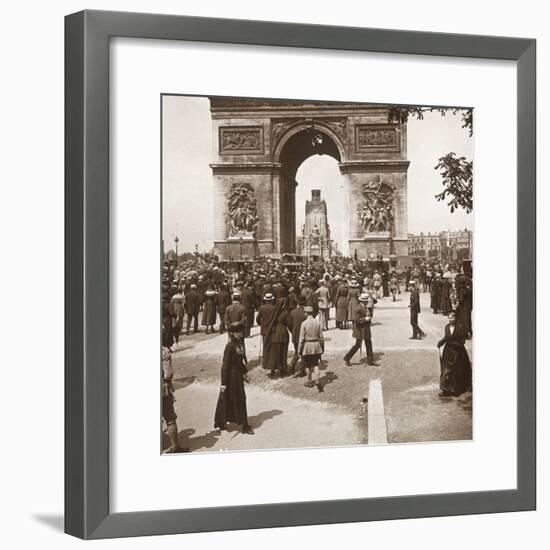Victory celebration, civilians at the Arc de Triomphe, Paris, France, July 1919-Unknown-Framed Photographic Print