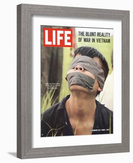 Viet Cong Prisoner of Cape Batangan Battle, Awaiting Transfer to US POW Compound, November 26, 1965-Paul Schutzer-Framed Photographic Print