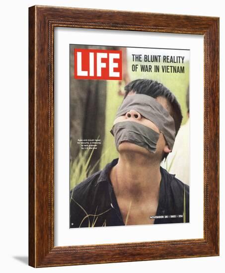 Viet Cong Prisoner of Cape Batangan Battle, Awaiting Transfer to US POW Compound, November 26, 1965-Paul Schutzer-Framed Photographic Print