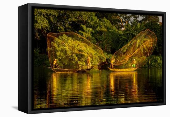 Vietnam. Butterfly net fishing. Fishermen working in complete synchronization.-Tom Norring-Framed Premier Image Canvas