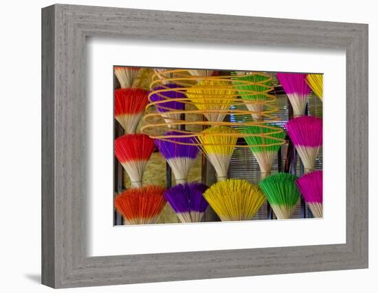 Vietnam. Colorful incense for sale.-Tom Norring-Framed Photographic Print