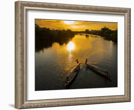 Vietnam. Coordinated lagoon fishing with nets at sunset.-Tom Norring-Framed Photographic Print