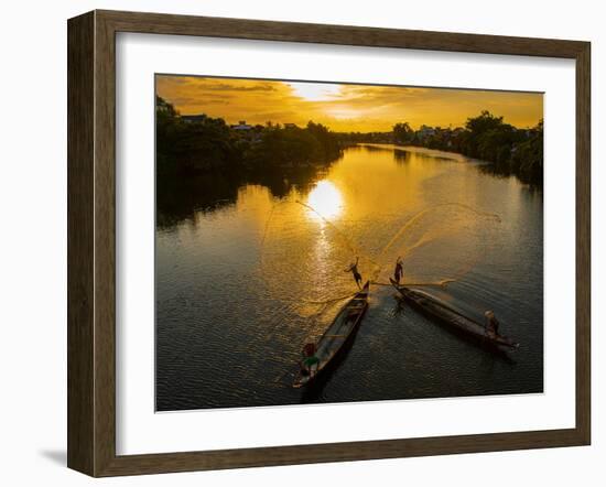 Vietnam. Coordinated lagoon fishing with nets at sunset.-Tom Norring-Framed Photographic Print