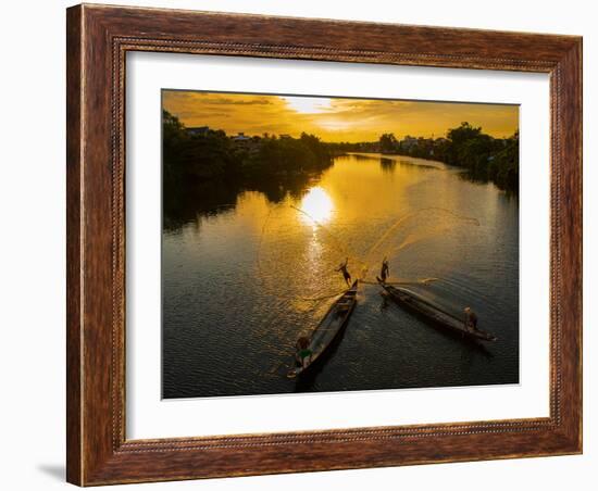 Vietnam. Coordinated lagoon fishing with nets at sunset.-Tom Norring-Framed Photographic Print