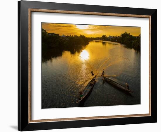 Vietnam. Coordinated lagoon fishing with nets at sunset.-Tom Norring-Framed Photographic Print