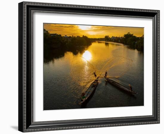 Vietnam. Coordinated lagoon fishing with nets at sunset.-Tom Norring-Framed Photographic Print