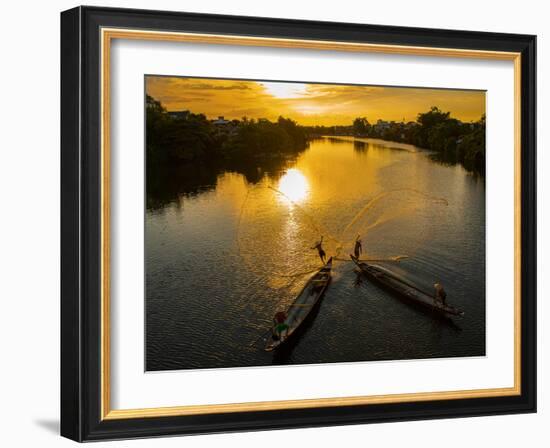 Vietnam. Coordinated lagoon fishing with nets at sunset.-Tom Norring-Framed Photographic Print