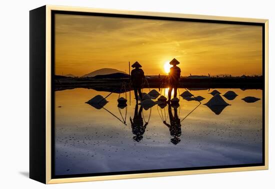 Vietnam. Doc Let Salt lake. Workers harvesting the salt. Early morning sunrise.-Tom Norring-Framed Premier Image Canvas