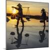 Vietnam. Doc Let Salt lake. Workers harvesting the salt. Early morning sunrise.-Tom Norring-Mounted Photographic Print