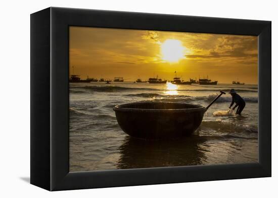 Vietnam. Fishermen deliver the nights catch to the beach at Hoi An.-Tom Norring-Framed Premier Image Canvas