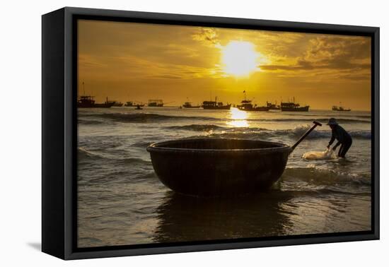 Vietnam. Fishermen deliver the nights catch to the beach at Hoi An.-Tom Norring-Framed Premier Image Canvas