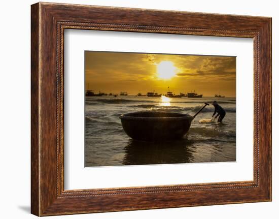 Vietnam. Fishermen deliver the nights catch to the beach at Hoi An.-Tom Norring-Framed Photographic Print