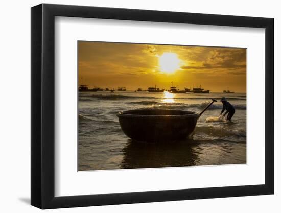 Vietnam. Fishermen deliver the nights catch to the beach at Hoi An.-Tom Norring-Framed Photographic Print