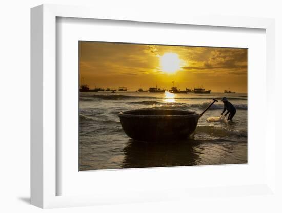 Vietnam. Fishermen deliver the nights catch to the beach at Hoi An.-Tom Norring-Framed Photographic Print