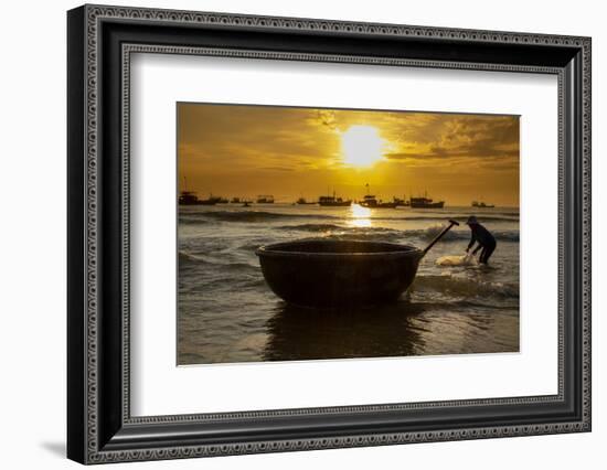 Vietnam. Fishermen deliver the nights catch to the beach at Hoi An.-Tom Norring-Framed Photographic Print