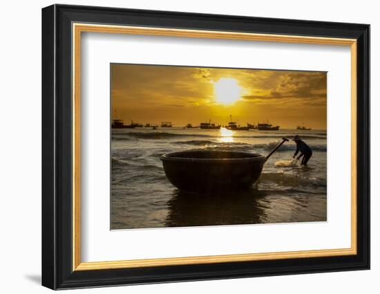 Vietnam. Fishermen deliver the nights catch to the beach at Hoi An.-Tom Norring-Framed Photographic Print