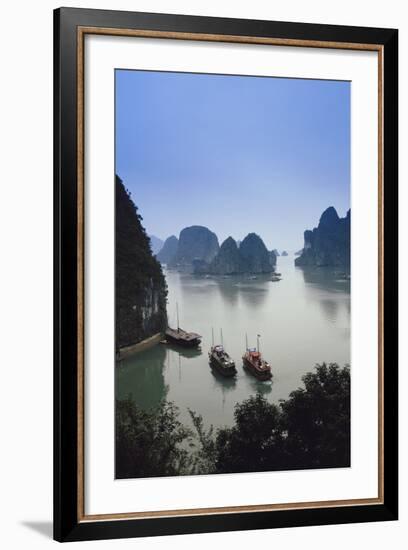 Vietnam, Halong Bay, Tourist Boats Anchor at the Cave of Marvels-Walter Bibikow-Framed Photographic Print