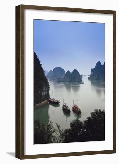 Vietnam, Halong Bay, Tourist Boats Anchor at the Cave of Marvels-Walter Bibikow-Framed Photographic Print