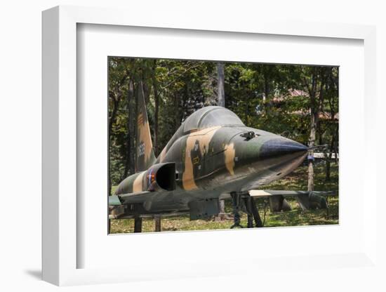 Vietnam, Ho Chi Minh City. Reunification Palace, Former South Vietnamese F-5E Fighter Plane-Walter Bibikow-Framed Photographic Print