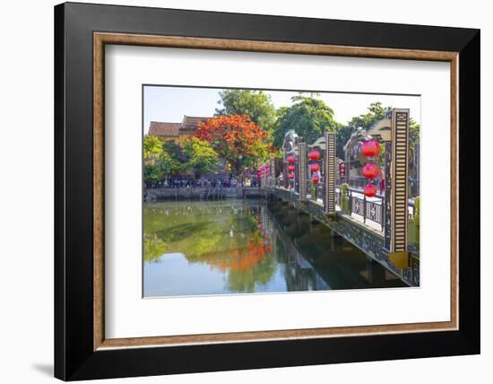 Vietnam. Hoi An bridge over the river with reflections and silk lamps.-Tom Norring-Framed Photographic Print