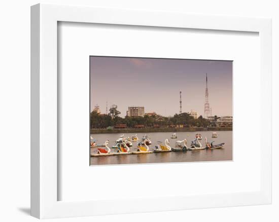 Vietnam, Hue. Perfume River and Tourist Swan Boats, Sunset-Walter Bibikow-Framed Photographic Print