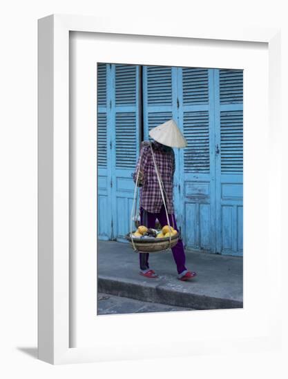 Vietnam. Street vendor with fruit and vegetable basket. Hoi Anh.-Tom Norring-Framed Photographic Print