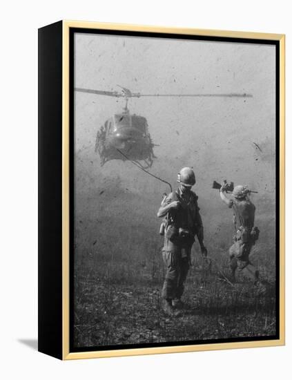 Vietnam War US Helicopter Landing-Henri Huet-Framed Premier Image Canvas