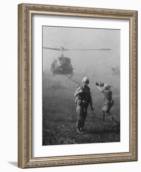 Vietnam War US Helicopter Landing-Henri Huet-Framed Photographic Print