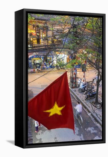 Vietnamese Flag and Street Scene, Hanoi, Vietnam-Peter Adams-Framed Premier Image Canvas