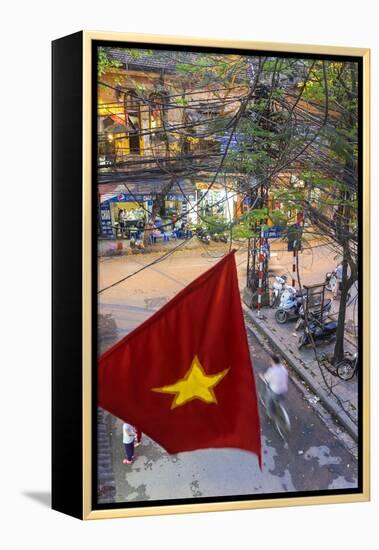 Vietnamese Flag and Street Scene, Hanoi, Vietnam-Peter Adams-Framed Premier Image Canvas