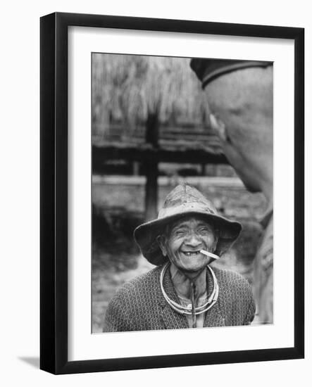 Vietnamese Montagnard Man Smoking Cigarette-Larry Burrows-Framed Photographic Print