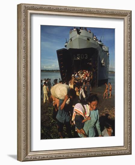 Vietnamese Refugees Arriving From Cambodia-Larry Burrows-Framed Photographic Print