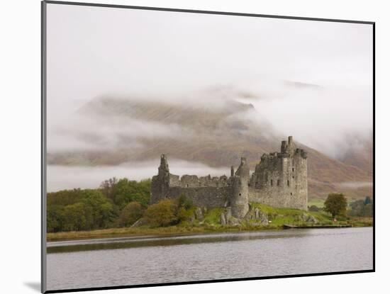 View across Loch Awe to the Ruins of Kilchurn Castle, Early Morning Mist on Mountains-Ruth Tomlinson-Mounted Photographic Print