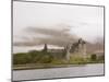 View across Loch Awe to the Ruins of Kilchurn Castle, Early Morning Mist on Mountains-Ruth Tomlinson-Mounted Photographic Print