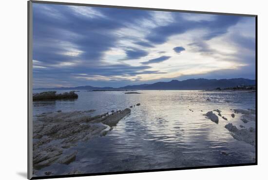 View across the tranquil waters of South Bay at dusk, Kaikoura, Canterbury, South Island, New Zeala-Ruth Tomlinson-Mounted Photographic Print