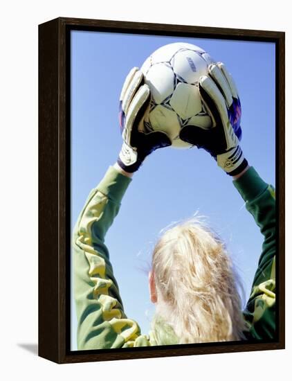 View from Behind of a Girl Holding a Soccer Ball-Steve Cicero-Framed Premier Image Canvas