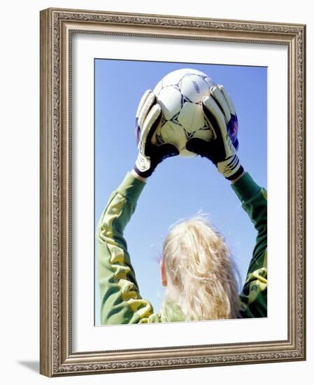 View from Behind of a Girl Holding a Soccer Ball-Steve Cicero-Framed Photographic Print