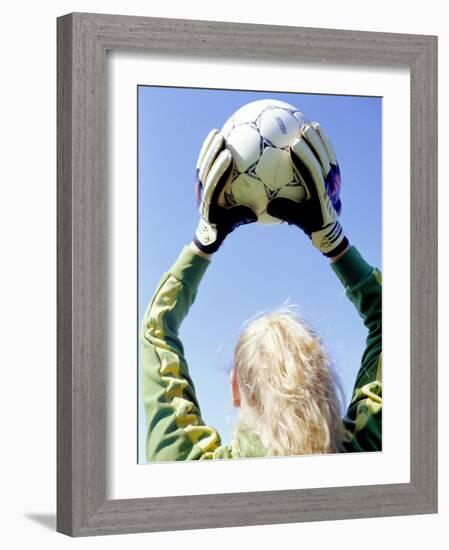 View from Behind of a Girl Holding a Soccer Ball-Steve Cicero-Framed Photographic Print