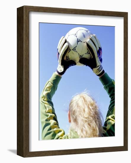 View from Behind of a Girl Holding a Soccer Ball-Steve Cicero-Framed Photographic Print