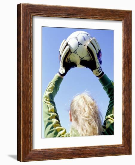 View from Behind of a Girl Holding a Soccer Ball-Steve Cicero-Framed Photographic Print