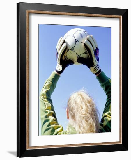 View from Behind of a Girl Holding a Soccer Ball-Steve Cicero-Framed Photographic Print