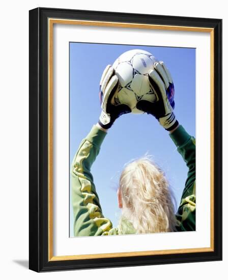 View from Behind of a Girl Holding a Soccer Ball-Steve Cicero-Framed Photographic Print