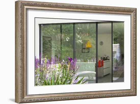 View from Garden Through Sliding Patio Doors to Modern Kitchen Beyond, London-Pedro Silmon-Framed Photo