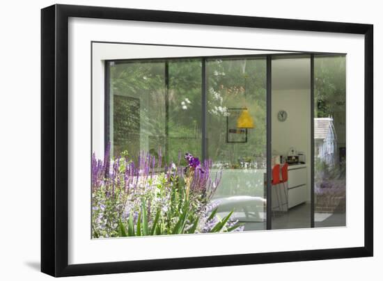 View from Garden Through Sliding Patio Doors to Modern Kitchen Beyond, London-Pedro Silmon-Framed Photo