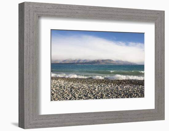 View from rocky shoreline across the stormy waters of Lake Pukaki, near Twizel, Mackenzie district,-Ruth Tomlinson-Framed Photographic Print