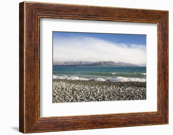 View from rocky shoreline across the stormy waters of Lake Pukaki, near Twizel, Mackenzie district,-Ruth Tomlinson-Framed Photographic Print